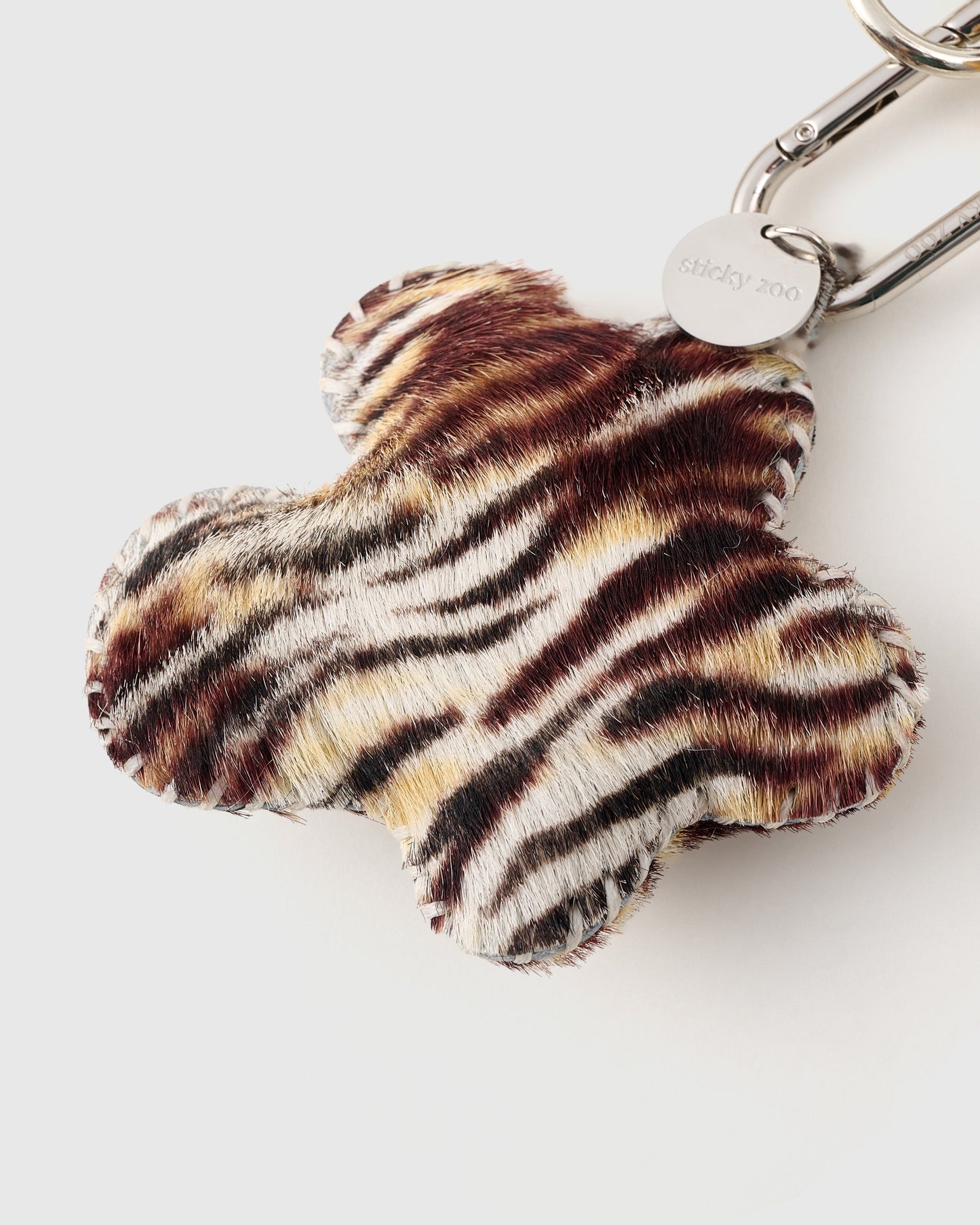 COWHIDE STAR ZEBRA-DUST STACK CHARM