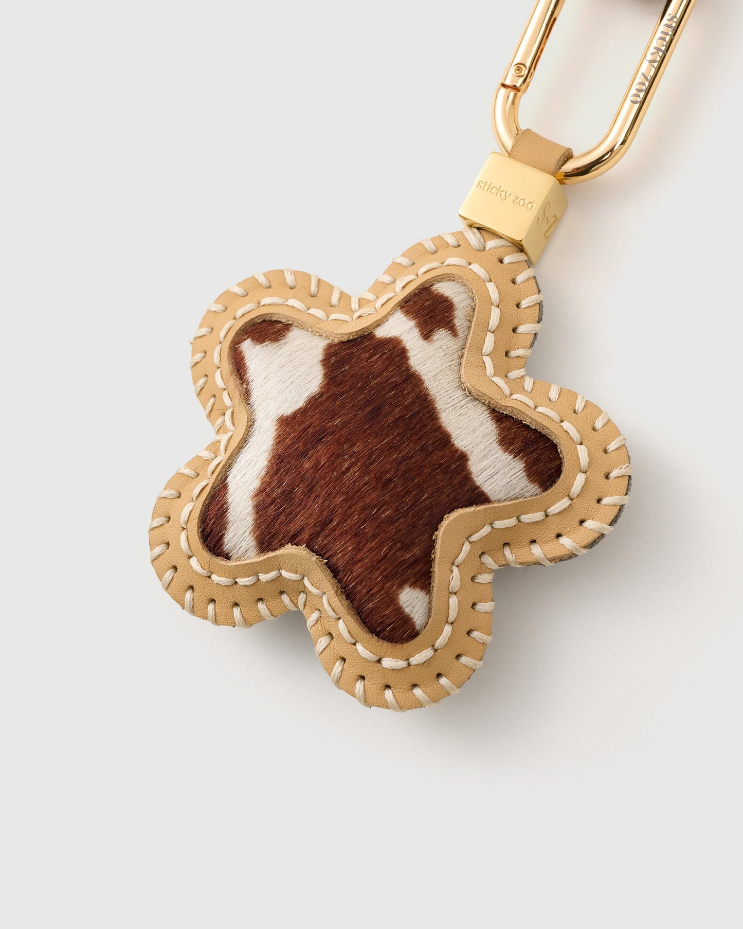 COWHIDE STAR STACK CHARM