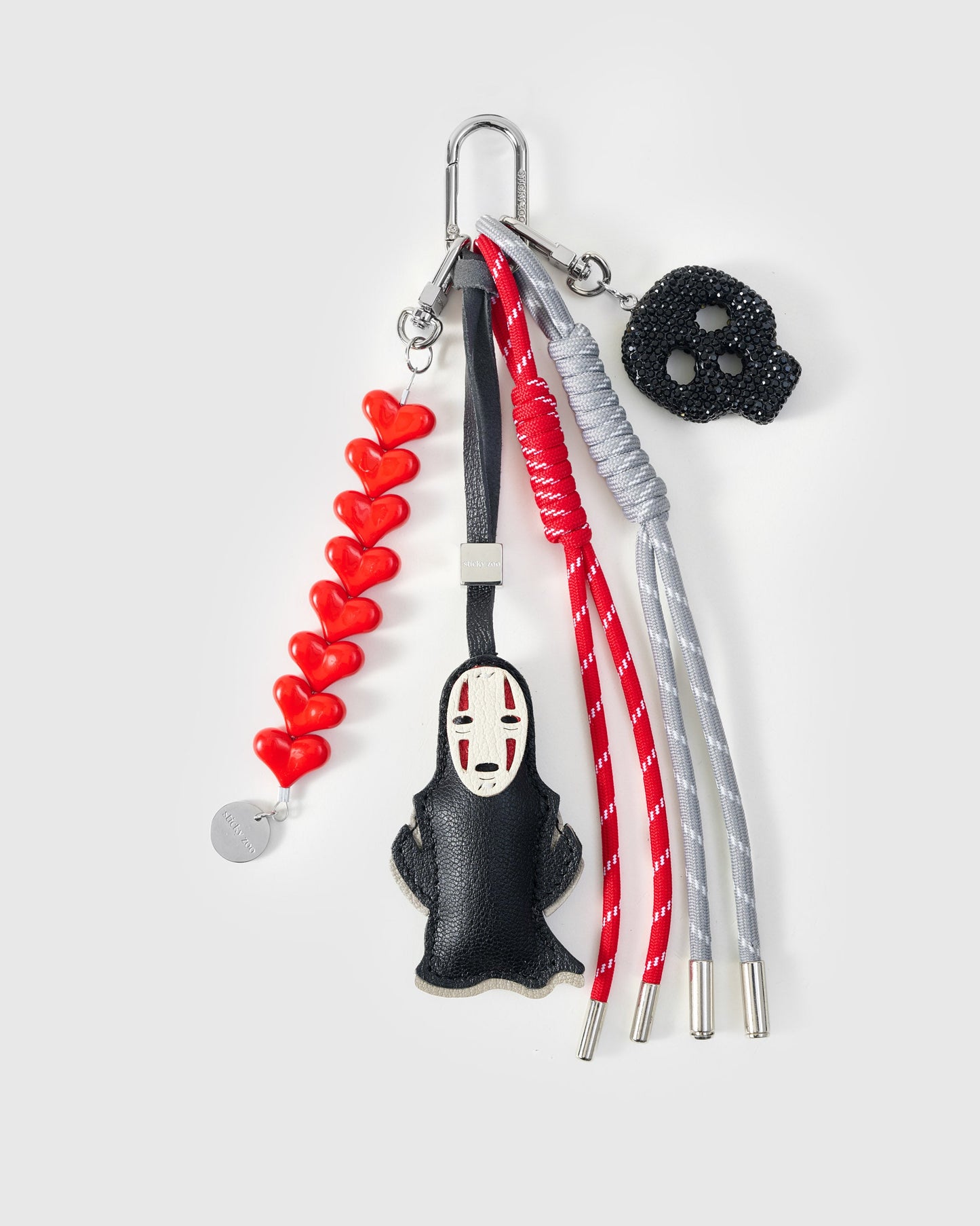 NO FACE HEART STACK CHARM