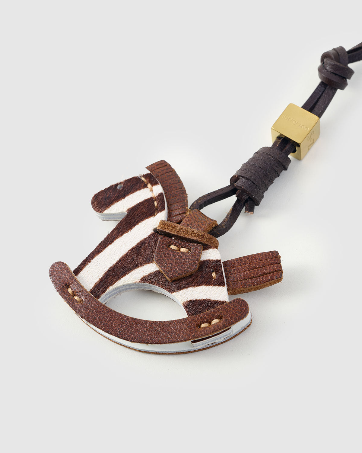 ZEBRA RIDE STACK CHARM