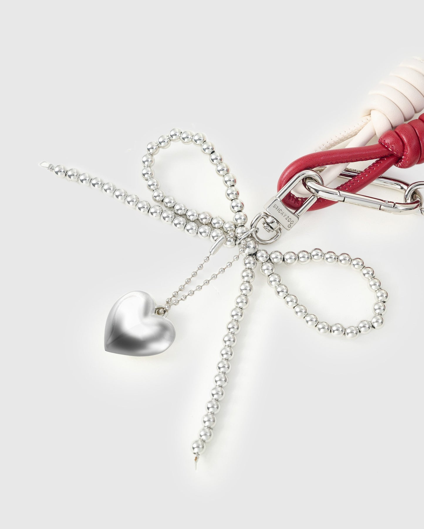 STICKY HEART BOW STACK CHARM